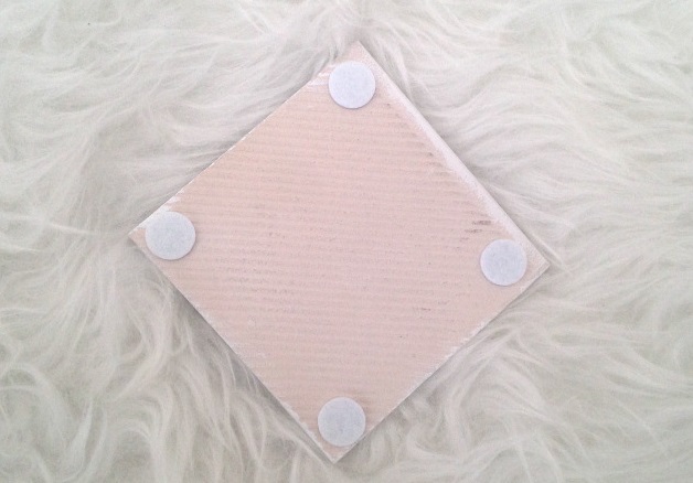 adhesive felt pads under each tile