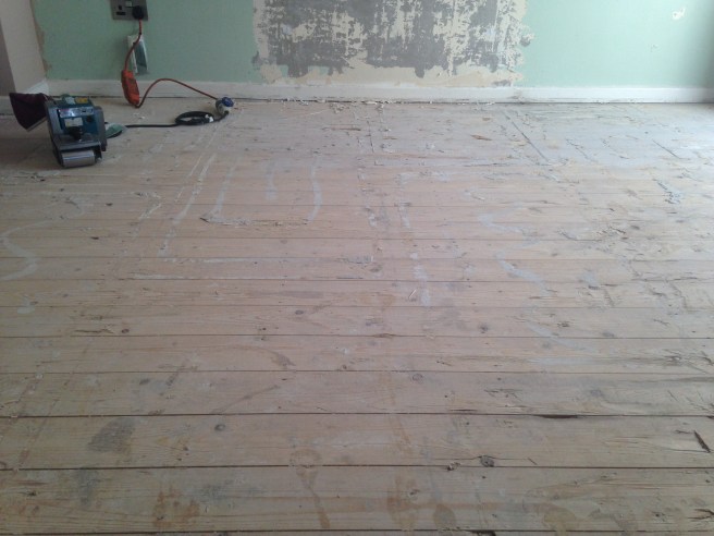 Floorboards before sanding